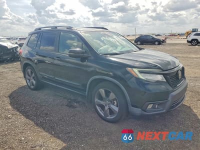 Czwarte zdjęcie samochodu z boku: 2020 HONDA PASSPORT TOURING VIN:5FNYF7H9XLB005659 - miniatura