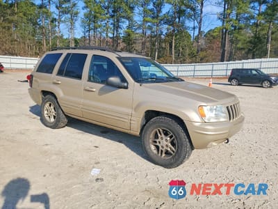 Czwarte zdjęcie samochodu z boku: 1999 JEEP GRAND CHEROKEE LIMITED VIN:1J4GW68NXXC624620 - miniatura