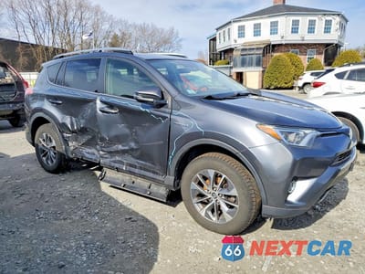 Czwarte zdjęcie samochodu z boku: 2017 TOYOTA RAV4 HYBRID XLE VIN:JTMRJREV9HD135012 - miniatura