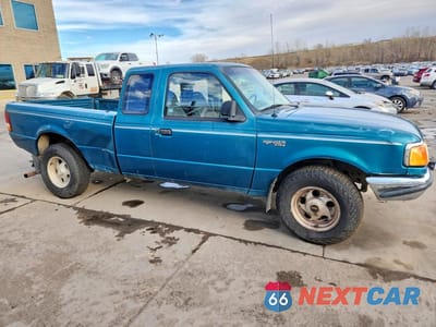 Czwarte zdjęcie samochodu z boku: 1994 FORD RANGER SUPER CAB VIN:1FTCR14X4RPA77426 - miniatura