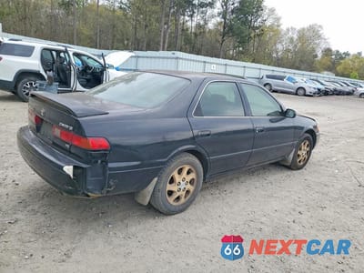 Trzecie zdjęcie samochodu z tyłu: 1999 TOYOTA CAMRY LE V6 VIN:JT2BF28K3X0155590 - miniatura