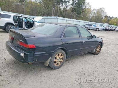 Trzecie zdjęcie samochodu z tyłu: 1999 TOYOTA CAMRY LE V6 VIN:JT2BF28K3X0155590 - miniatura