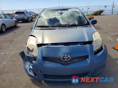 Piąte zdjęcie samochodu w środku: 2010 TOYOTA YARIS BASE VIN:JTDKT4K30A5281980 - miniatura