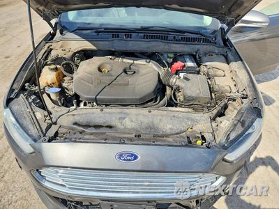Zdjęcie 11 z 12 samochodu: 2014 FORD FUSION TITANIUM VIN:3FA6P0K9XER351982 - miniatura