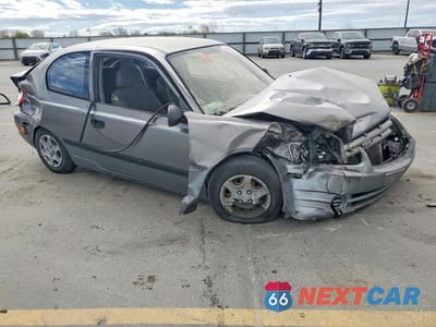 Czwarte zdjęcie samochodu z boku: 2004 HYUNDAI ACCENT BASE VIN:KMHCF35C54U299849 - miniatura