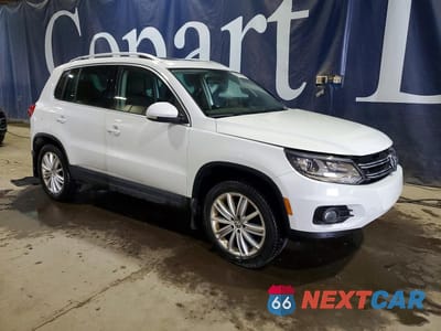 Czwarte zdjęcie samochodu z boku: 2016 VOLKSWAGEN TIGUAN S VIN:WVGBV7AX5GW576815 - miniatura