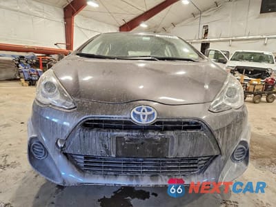 Piąte zdjęcie samochodu w środku: 2015 TOYOTA PRIUS C VIN:JTDKDTB37F1107748 - miniatura