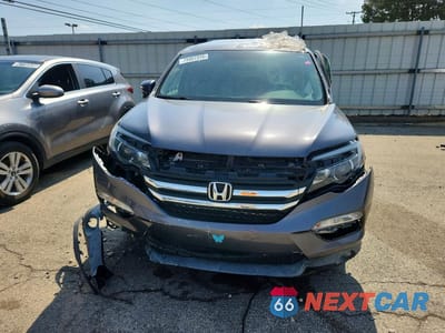 Piąte zdjęcie samochodu w środku: 2018 HONDA PILOT EXL VIN:5FNYF6H55JB011597 - miniatura