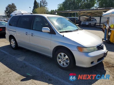 Czwarte zdjęcie samochodu z boku: 2004 HONDA ODYSSEY EX VIN:5FNRL18694B062016 - miniatura