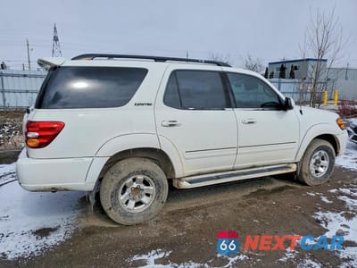 Trzecie zdjęcie samochodu z tyłu: 2002 TOYOTA SEQUOIA LIMITED VIN:5TDBT48A82S057907 - miniatura