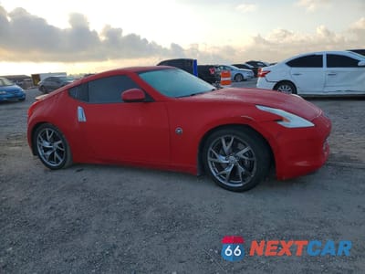 Czwarte zdjęcie samochodu z boku: 2012 NISSAN 370Z BASE VIN:JN1AZ4EH9CM562320 - miniatura