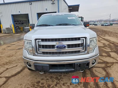 Piąte zdjęcie samochodu w środku: 2014 FORD F150 XLT 4WD VIN:1FTFW1ET4EFC94850 - miniatura