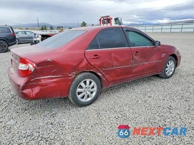 Trzecie zdjęcie samochodu z tyłu: 2002 TOYOTA CAMRY XLE VIN:JTDBE30K520063837 - miniatura