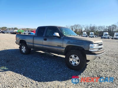 Czwarte zdjęcie samochodu z boku: 1999 CHEVROLET SILVERADO K1500 VIN:1GCEK19T1XE250489 - miniatura