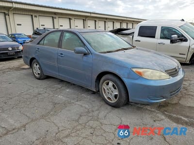 Czwarte zdjęcie samochodu z boku: 2003 TOYOTA CAMRY LE V6 VIN:4T1BF32K13U552655 - miniatura