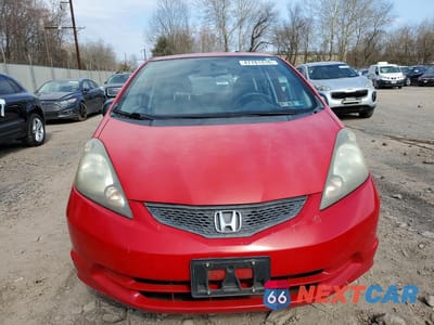 Piąte zdjęcie samochodu w środku: 2011 HONDA FIT VIN:JHMGE8H34BS002885 - miniatura