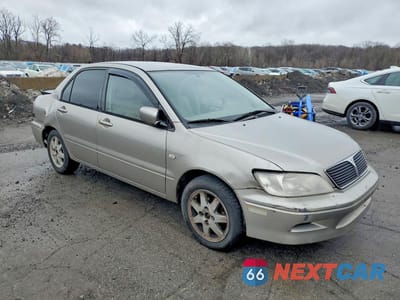 Czwarte zdjęcie samochodu z boku: 2002 MITSUBISHI LANCER LS VIN:JA3AJ36E22U064573 - miniatura