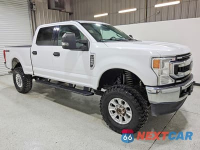 Czwarte zdjęcie samochodu z boku: 2021 FORD F250 SUPER DUTY VIN:1FT7W2B68MEC68605 - miniatura