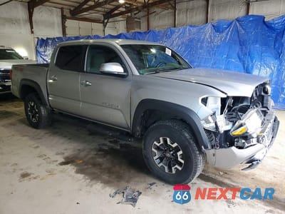 Czwarte zdjęcie samochodu z boku: 2018 TOYOTA TACOMA TRD OFF-ROAD VIN:3TMCZ5AN5JM124239 - miniatura