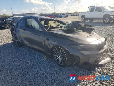 Czwarte zdjęcie samochodu z boku: 2017 BMW M2 VIN:WBS1H9C37HV887840 - miniatura