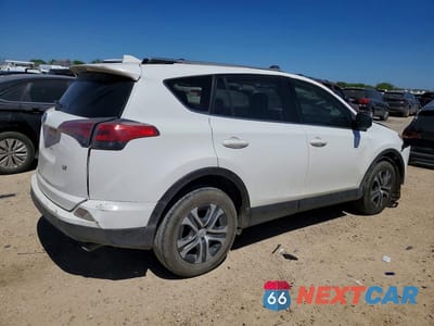 Trzecie zdjęcie samochodu z tyłu: 2018 TOYOTA RAV4 LE VIN:JTMZFREV4JJ729595 - miniatura
