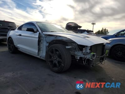 Czwarte zdjęcie samochodu z boku: 2019 FORD MUSTANG VIN:1FA6P8TH4K5178236 - miniatura
