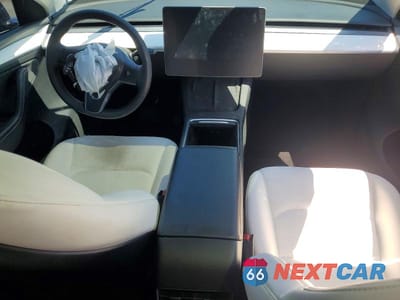 Zdjęcie 8 z 13 samochodu: 2023 TESLA MODEL Y VIN:7SAYGDEE7PA141475 - miniatura