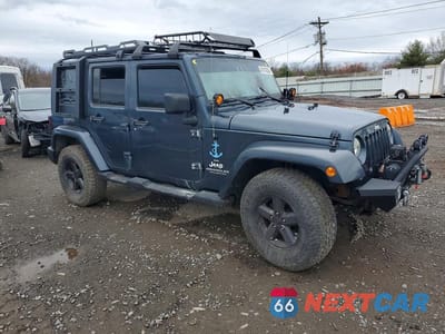 Czwarte zdjęcie samochodu z boku: 2008 JEEP WRANGLER UNLIMITED SAHARA VIN:1J4GA59148L553727 - miniatura