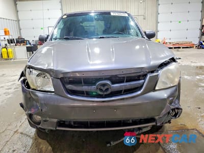 Piąte zdjęcie samochodu w środku: 2003 MAZDA TRIBUTE LX VIN:4F2YZ941X3KM47248 - miniatura