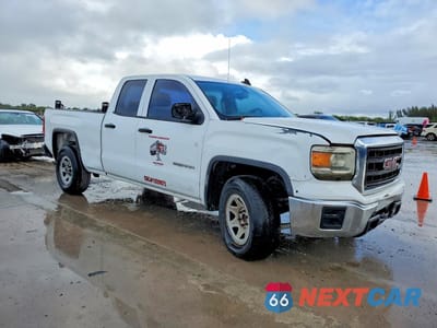 Czwarte zdjęcie samochodu z boku: 2015 GMC SIERRA C1500 VIN:1GTR1TEH5FZ307429 - miniatura