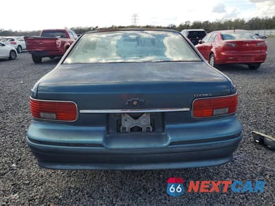 Zdjęcie 6 z 12 samochodu: 1996 CHEVROLET CAPRICE CLASSIC VIN:1G1BL52W3TR125615 - miniatura