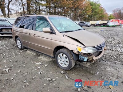 Czwarte zdjęcie samochodu z boku: 2003 HONDA ODYSSEY EXL VIN:5FNRL18983B122215 - miniatura