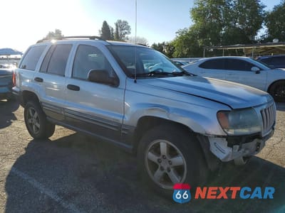 Czwarte zdjęcie samochodu z boku: 2004 JEEP GRAND CHEROKEE LAREDO VIN:1J4GX48S84C301234 - miniatura