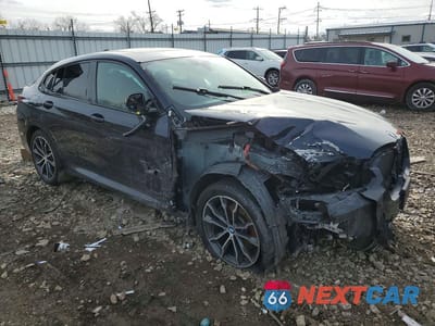 Czwarte zdjęcie samochodu z boku: 2022 BMW X4 XDRIVE30I VIN:5UX33DT00N9K76476 - miniatura
