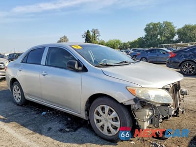 Czwarte zdjęcie samochodu z boku: 2009 TOYOTA COROLLA BASE VIN:1NXBU40E19Z138180 - miniatura