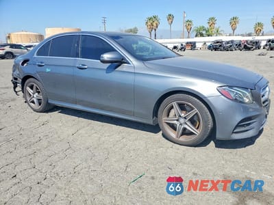 Czwarte zdjęcie samochodu z boku: 2017 MERCEDES-BENZ E 300 VIN:WDDZF4JB4HA014413 - miniatura