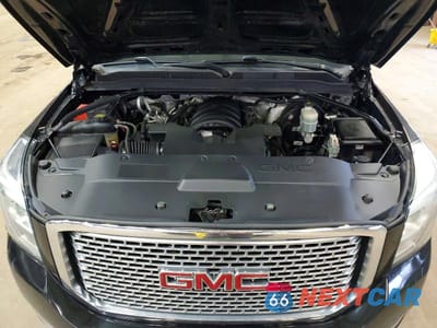 Zdjęcie 12 z 12 samochodu: 2016 GMC YUKON XL DENALI VIN:1GKS2HKJXGR334912 - miniatura