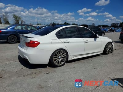 Trzecie zdjęcie samochodu z tyłu: 2013 BMW 335 XI VIN:WBA3B9C50DF140455 - miniatura