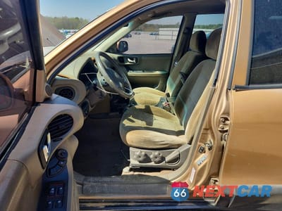 Zdjęcie 7 z 13 samochodu: 2004 HYUNDAI SANTA FE GLS VIN:KM8SC13D04U593034 - miniatura