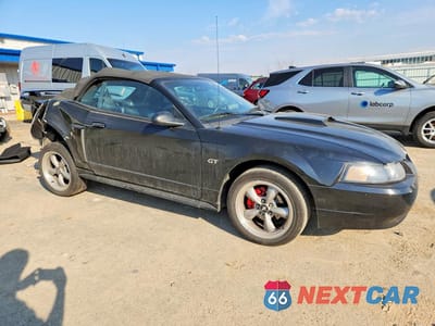 Czwarte zdjęcie samochodu z boku: 2002 FORD MUSTANG GT VIN:1FAFP45XX2F211571 - miniatura