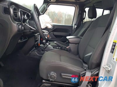 Zdjęcie 7 z 12 samochodu: 2023 JEEP WRANGLER SPORT VIN:1C4HJXDG1PW578003 - miniatura