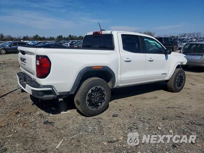 Trzecie zdjęcie samochodu z tyłu: 2026 GMC CANYON AT4 VIN:1GTP2DEK8T1116636 - miniatura