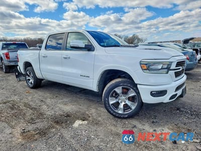 Czwarte zdjęcie samochodu z boku: 2022 RAM 1500 LARAMIE VIN:1C6SRFJT1NN322643 - miniatura
