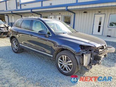 Czwarte zdjęcie samochodu z boku: 2016 VOLKSWAGEN TOUAREG TDI VIN:WVGEP9BP7GD004254 - miniatura