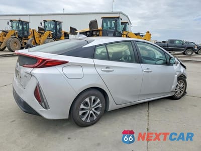 Trzecie zdjęcie samochodu z tyłu: 2021 TOYOTA PRIUS PRIME XLE VIN:JTDKAMFP6M3170305 - miniatura