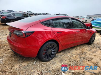 Trzecie zdjęcie samochodu z tyłu: 2022 TESLA MODEL 3 VIN:5YJ3E1EC7NF199614 - miniatura