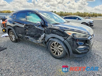 Czwarte zdjęcie samochodu z boku: 2017 HYUNDAI TUCSON SE PLUS VIN:KM8J33A45HU429679 - miniatura