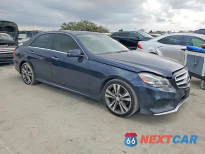 Czwarte zdjęcie samochodu z boku: 2016 MERCEDES-BENZ E 350 VIN:WDDHF5KB6GB310963 - miniatura