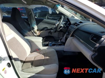 Zdjęcie 7 z 11 samochodu: 2012 TOYOTA CAMRY HYBRID LE VIN:4T1BD1FKXCU042230 - miniatura