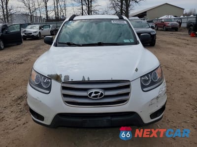 Piąte zdjęcie samochodu w środku: 2012 HYUNDAI SANTA FE GLS VIN:5XYZGDAG9CG128368 - miniatura